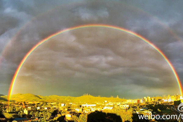 Double rainbow adds color to Beijing's clear blue sky