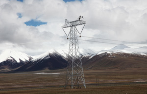 Men dangling on power lines