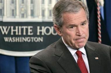US President Bush listens to a question at a news conference at the White House, Tuesday, March 21, 2006 in Washington. Bush said Tuesday there will be 'more tough fighting ahead' in Iraq, but denied claims that the nation is in the grips of a civil war three years after the U.S.-led invasion.[AP]