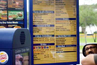 Four burgers at his neighborhood Burger King cost George Beane a whopping $4,334.33.