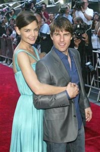 Tom Cruise has been practically shouting from the rooftops about his love for his pregnant fiancee, Katie Holmes. But when their much-anticipated baby is born, the superstar dad probably won't say a word.