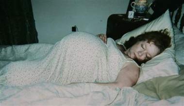 In this photo provided, Tuesday, April 11, 2006, in Grain Valley, Mo., by the Everson family, shown is Sarah Everson, apparently pregnant with sextuplets, date unknown. A couple's dramatic account of newborn sextuplets turned out Tuesday to be nothing more than an elaborate scam. The Everson's story about their six babies' births had holes in it from the very start, from their mysterious withholding of information for more than a month to the unanimous response of area hospitals that they had no such newborns. Authorities said the couple admitted Tuesday evening that the entire thing was a hoax aimed at tapping the generosity of others to pay their mounting bills.