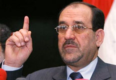 Jawad al-Maliki, spokesman for the Dawa party speaks to journalists Thursday April 20, 2006, in Baghdad, Iraq. Al-Maliki and another leading Dawa politician, Ali al-Adeeb, have been touted as possible replacements for al-Jaafari, who cleared the way for Shiite leaders to withdraw his nomination for a second term Thursday, a step that could mark a breakthrough in the months-long effort to form a new government.(AP