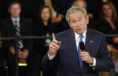 US President George W. Bush answers an audience member's question following his address to the Orange County Business Council in Irvine, California, April 24, 2006. [Reuters/file]