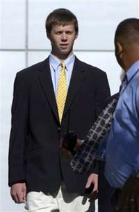 Duke lacrosse player Collin Finnerty leaves the Durham County Detention Center, Tuesday, April 18, 2006, in Durham, North Carolina. Finnerty was arrested and charged with first degree forcible rape, first degree sexual assault and kidnapping in the case involving an exotic dancer who allegedly was raped while dancing at a party thrown by members of the Duke lacrosse team. [AP Photo] 