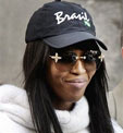 Naomi Campbell is led out of Midtown North police precinct in New York, Thursday, March 30, 2006. Another maid is suing Campbell, claiming the supermodel hit her. (AP Photo/