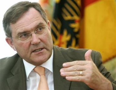 Iran should be allowed to enrich uranium for power generation provided there is close monitoring by U.N. inspectors to ensure it is not trying to develop atomic weapons, Germany's defense minister said.