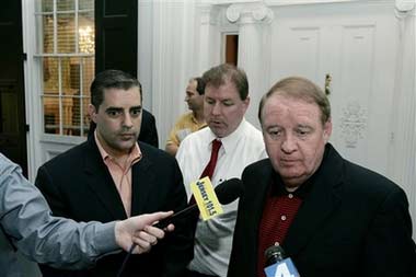 New Jersey state Senate president Richard J. Codey, right, D-Essex listens to a question as he stands on the steps of the governor's mansion, Drumthwacket, in Princeton, N.J., with Assemblyman Joseph Cryan, D-Union and Tom Shea, left, chief of staff for Gov. Jon S. Corzine, following a meeting to work on budget issues Sunday, July 2, 2006. Sunday marked the first full day since Corzine closed state government amid a budget impasse with fellow Democrats in the Assembly. Codey said very little progress was made at the meeting. (AP Photo