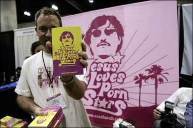 Members of the XXXChurch a Christian-faith group distribute the "bible" during the 10th Annual Erotica LA in Los Angeles Convention Center in JUne 2006. A Christian missionary group making the rounds at US adult entertainment conventions hands out Bibles with "Jesus loves porn stars" stamped on their covers.(
