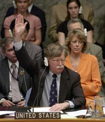 US Ambassador to the UN John Bolton (front C) vetoes a resolution before the UN Security Council condemning Israel for incursions in the Gaza Strip, at the United Nations in New York July 13, 2006. Ten of the 15 member nations voted in support of the resolution, four abstained and the US vetoed.