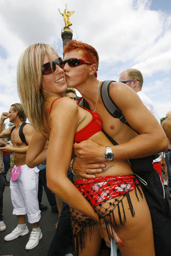 Techno fans from Poland pose for photographers during the world's biggest open-air street party with the fitting motto 'Loveparade 2006 - The Love is Back' in Berlin on July 15, 2006.