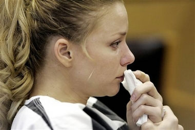 Pamela Rogers listens to testimony in circuit court in McMinnville, Tenn., Friday, July 14, 2006, during her probation revocation hearing. Rogers, a former teacher who has already served jail time for having sex with a 13-year-old student, was sent to prison for more than six years Friday for violating her probation by sending the boy nude photos of herself. (AP