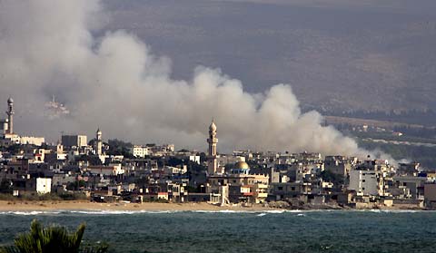 A view of smoke raising over Alaamreya, near Southern Lebanon's town of Tyre (Soure), after an Israeli air strike July 20, 2006
