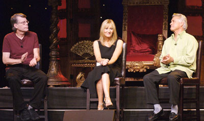 Bestselling authors Stephen King (L), J.K. Rowling (C) and John Irving take questions from the audience during an event called "An Evening With Harry, Carrie & Garp," at Radio City Music Hall in New York August 1, 2006. The authors are reading from their books on Tuesday and Wednesday as a fundraiser for Doctors Without Borders and The Haven Foundation. 
