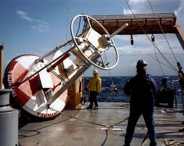 In this undated photo released by the NOAA (National Oceanic and Atmospheric Administration), a Tsunami buoy on the NOAA ship 'Ronald H. Brown' in the Pacific Ocean by the National Oceanic and Atmospheric Administration. Within weeks of the devasting 2004 quake and tsunami, governments across the Indian Ocean vowed to establish a tsunami warning system that would protect their coastal residents from another disaster, but 18 months later, the system remains largely in the planning stage and remains years away from being fully implemented. (AP Photo