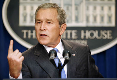 U.S. President George W. Bush speaks at a news conference at the new briefing room at the White House Conference Center, across Pennsylvania Avenue from the White House, in Washington August 21, 2006. 