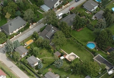 Areal view of the estate where Austrian teenager Natascha Kampusch spent eight years in a dingy underground cell until her dramatic escape last week, on Tuesday, Aug. 29, 2006, in Strasshof, northeast of Vienna. (AP