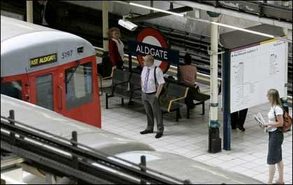 Commuters wait to board a tube at Aldgate underground station in East London in July 2006. According to a survey published one in six people in Britain's capital have admitted moving seats on public transport to avoid a passenger they think is Muslim.(AFP/File/Phil Noble)