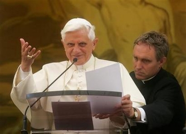 Pope Benedict gestures to the faithful during his Sunday Angelus prayer from his summer residence in Castel Gandolfo, outside Rome, September 17, 2006. (Dario Pignatelli/Reuters) 
