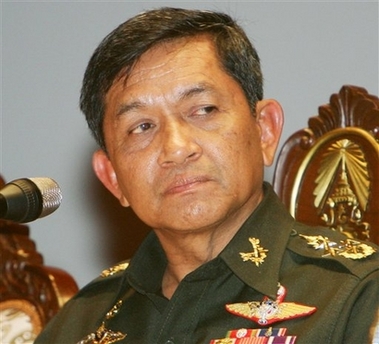 Thailand's Army Commander-in-Chief Gen. Sondhi Boonyaratkalin listens to a reporter's questions in Bangkok Wednesday, Sept. 20, 2006. The army general who ousted Prime Minister Thaksin Shinawatra indicated Wednesday that the fallen leader could be prosecuted for wrongdoing and said a post-coup interim government would retain power for no more than one year. Transitional government to be formed in Thailand after two weeks, following coup, says Gen. Sondhi. (AP 