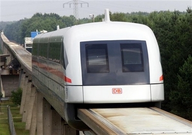A German high speed magnetic float train, Transrapid, is seen at the experimental center in Lathen, northern Germany, on July 2, 2000. A high-speed magnetic train went off a test track nearby Osnabrueck, northwestern Germany, Friday, Sept. 22, 2006 injuring 25 people, police said. (AP