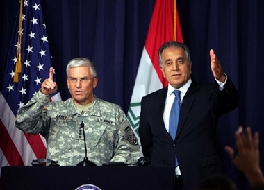 Top U.S. commander in Iraq, General George Casey,left, and U.S. Ambassador to Iraq Zalmay Khalilzad answer questions during a press conference at the heavily fortified Green Zone in Baghdad, Tuesday Oct. 24, 2006. Iraqi forces should be able to take full control of security in the country within the next 12 to 18 months with minimal American support, Gen. George Casey, the top US commander in Iraq, said on Tuesday. (AP