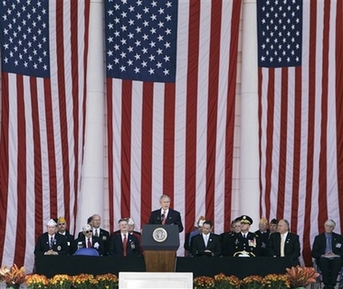 President Bush, center, speaks during the Veterans Day commemoration at Arlington National Cemetery, Saturday, Nov. 11, 2006, in Arlington, Va. (AP