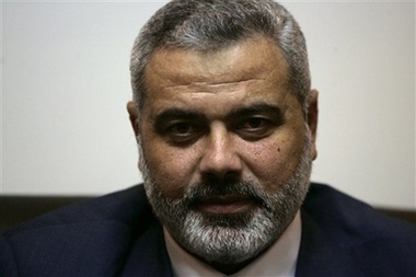 Palestinian Authority Prime Minister Ismail Haniyeh of the Hamas pauses during a meeting with former Palestinian Prime Minister Ahmed Qureia of the Fatah, not seen, in Gaza city, Sunday, Nov. 12, 2006. Palestinian President Mahmoud Abbas from Fatah said he expected to reach a long-delayed deal on forming a joint government with the militant Hamas group by the end of the month. Hamas officials also said a deal was close. (AP