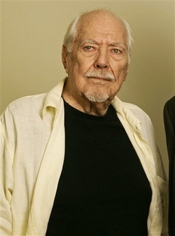 Director Robert Altman poses Oct. 3, 2006, in Beverly Hills, Calif. Altman, the caustic and irreverent satirist behind 'M-A-S-H,' 'Nashville' and 'The Player' who made a career out of bucking Hollywood management and story conventions, died at a Los Angeles Hospital, his Sandcastle 5 Productions Company said Tuesday,Nov 21, 2006. He was 81. (AP
