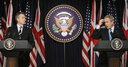 U.S. President George W. Bush and British Prime Minister Tony Blair (L) speak to reporters after their meeting at the White House in Washington December 7, 2006. The two leaders met to consider the future course in Iraq a day after a report said the current U.S. military and diplomatic strategy was not working. 