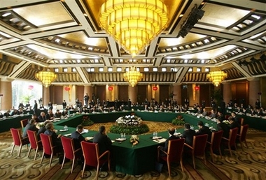 Six-Party talks on North Korea's nuclear program resume in Beijing with top envoys representing their respective countries seated around the table for discussions at the Diaoyutai State Guesthouse on Monday December 18, 2006. 
