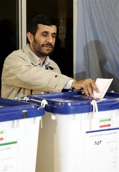 Iran's President Mahmoud Ahmadinejad, casts his ballot for for the Assembly of Experts, a body of 86 senior clerics that is charged with monitoring Iran's supreme leader and choosing his successor, in Tehran on Friday, Dec. 15, 2006. Iranians go to the polls Friday for local council and the Assembly of Expert elections that are expected to be a first test of support for hard-line President Mahmoud Ahmadinejad since he took office more than a year ago. (AP
