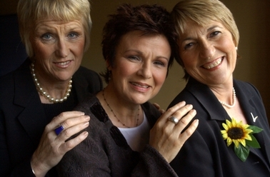 Tricia Stewart, left, Julie Walters, center, and Angela Baker pose for a portrait during a promotional trip for the film 'Calendar Girls' in New York Nov. 14, 2003.