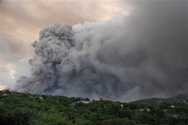 A cloud of superheated ash and gas flows from the Soufriere Hills volcano, as seen from Olveston, Montserrat, Monday, Jan. 8, 2007. 
