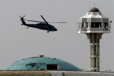  U.S. Army Black Hawk helicopter flies over Baghdad's heavily fortified Green Zone, Iraq, Wednesday, Feb. 7, 2007. The U.S. military said it was investigating reports that an aircraft went down Wednesday and the reports came five days after a U.S. Army helicopter crashed in a hail of gunfire north of Baghdad, - the fourth helicopter lost in Iraq in a two-week span. (AP