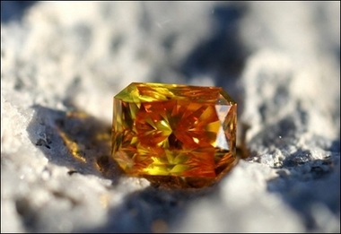 This photo released by LifeGem in October 2005 shows a diamond made from the ashes of cremated remains. Sue Rogers from Devon will never be without her dead dogs and cat after having a diamond ring made from their ashes.(AFP