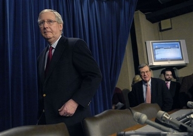 Senate Minority Leader Sen. Mitch McConnell, R-Ky., arrives for a news conference in the Capitol in Washington Saturday, Feb. 17, 2007 after Republicans blocked a Democratic effort to pass a nonbinding resolution rebuking President Bush's deployment of additional combat troops to Iraq. McConnell is followed by Sen. Trent Lott, R-Miss. (AP