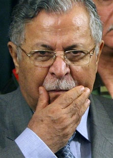 Iraq's President Jalal Talabani pauses after announcing new security plans for the country in this Aug. 2, 2006 file photo, in the fortified Green Zone area of Baghdad, Iraq. Talabani is ill and has flown to neighboring Jordan for medical treatment, his office said Sunday Feb. 25, 2007, adding there was 'no cause for worry.' (AP 