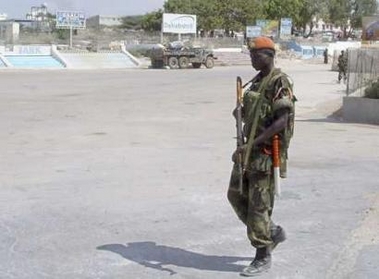 A Ugandan African Union peacekeeper patrols in Mogadishu, March 12, 2007. The Somali government hopes to pacify Mogadishu within 30 days, a senior official said on Sunday, in a test for the interim administration which welcomed the vanguard of an African peacekeeping mission this week.