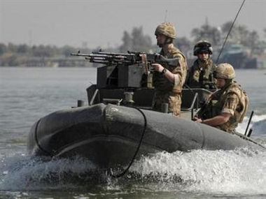 A British patrol boat conducts a patrol in the Shatt al-Arab waterways of Basra, south of Baghdad, February 15, 2007. 