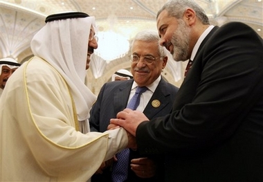 Emir of Kuwait Sheik Sabah Al Ahmed Al Sabah, left, Palestinian Authority president Mahmoud Abbas, center and Palestinian Prime Minister Ismail Haniyeh talk during the closing session of the annual summit of the Arab league at the King Abdul Aziz Conventional Center in Riyadh, Saudi Arabia Thursday, March 29, 2007. 