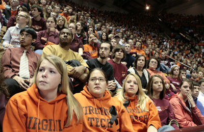 Students attend a convocation a day after the killings at Virginia Tech in Blacksburg, Virginia, April 17, 2007. Virginia Tech student Cho Seung-hui from South Korea was identified on Tuesday as the gunman who killed 32 people at the university in the deadliest shooting rampage in modern U.S. history. 