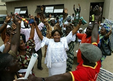 Supporters of Umaru Yar'Adua celebrate outside the Lagos headquarters of the People's Democratic Party in Lagos, Nigeria, Monday, April 23, 2007.