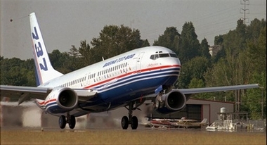 The first Boeing 737-800, the longest 737 ever built, takes off on it's first flight Thursday, July 31, 1997, in Renton, Wash. Kenya Airways has lost contact with a commercial airliner, similar to the one shown, early Saturday May 5, 2007 the airline said.