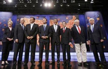 Democratic presidential candidates pose prior to the start of their debate at Howard University in Washington June 28, 2007.