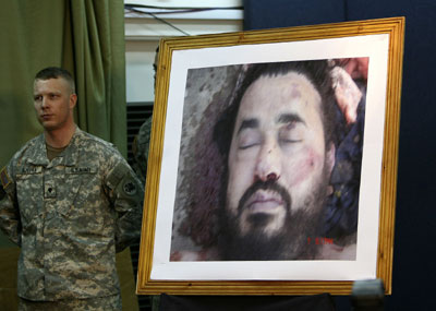 Battered al-Zarqawi photos showed, US, UK hail