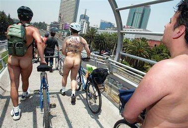 Nude cyclists peel off around Spanish cities