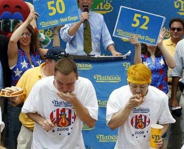 Japanese eater devours 53-plus hotdogs to win eating contest