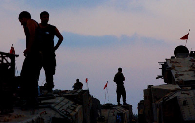 Israel hits Lebanon from air and by land