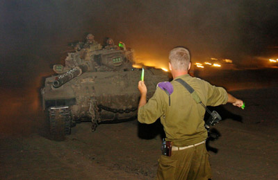 Israel hits Lebanon from air and by land